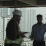 A professional construction site showcasing project management and urban development activities, highlighting modern infrastructure, skilled teamwork, and premium real estate construction standards.